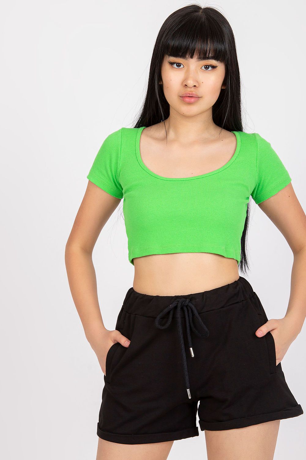 Vibrant green crop top worn with BFG Men's Luxury Cotton Black Sweatshorts, exuding a trendy summer vibe.