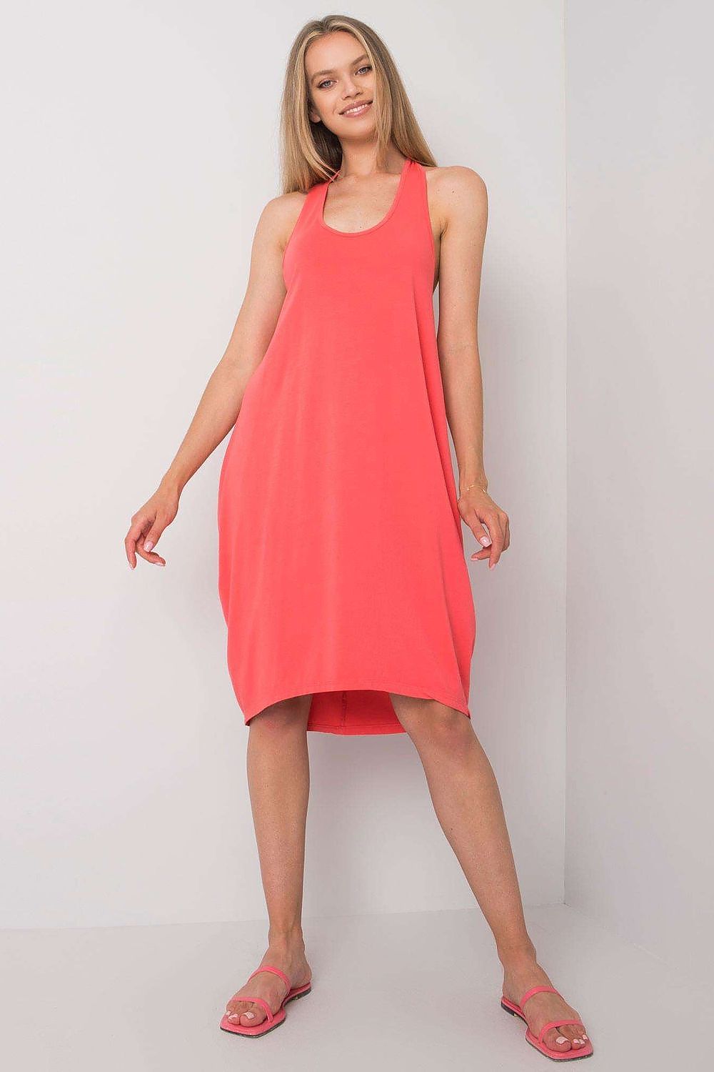 Front view of the Och Bella Sleeveless Cotton Spandex Daydress in coral, elegantly designed for casual wear, offering a chic and sophisticated look for summer.