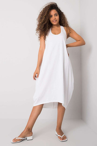 Model presenting the Och Bella Sleeveless Cotton Spandex Daydress in white, exuding elegance and comfort, ideal for warm summer outings.