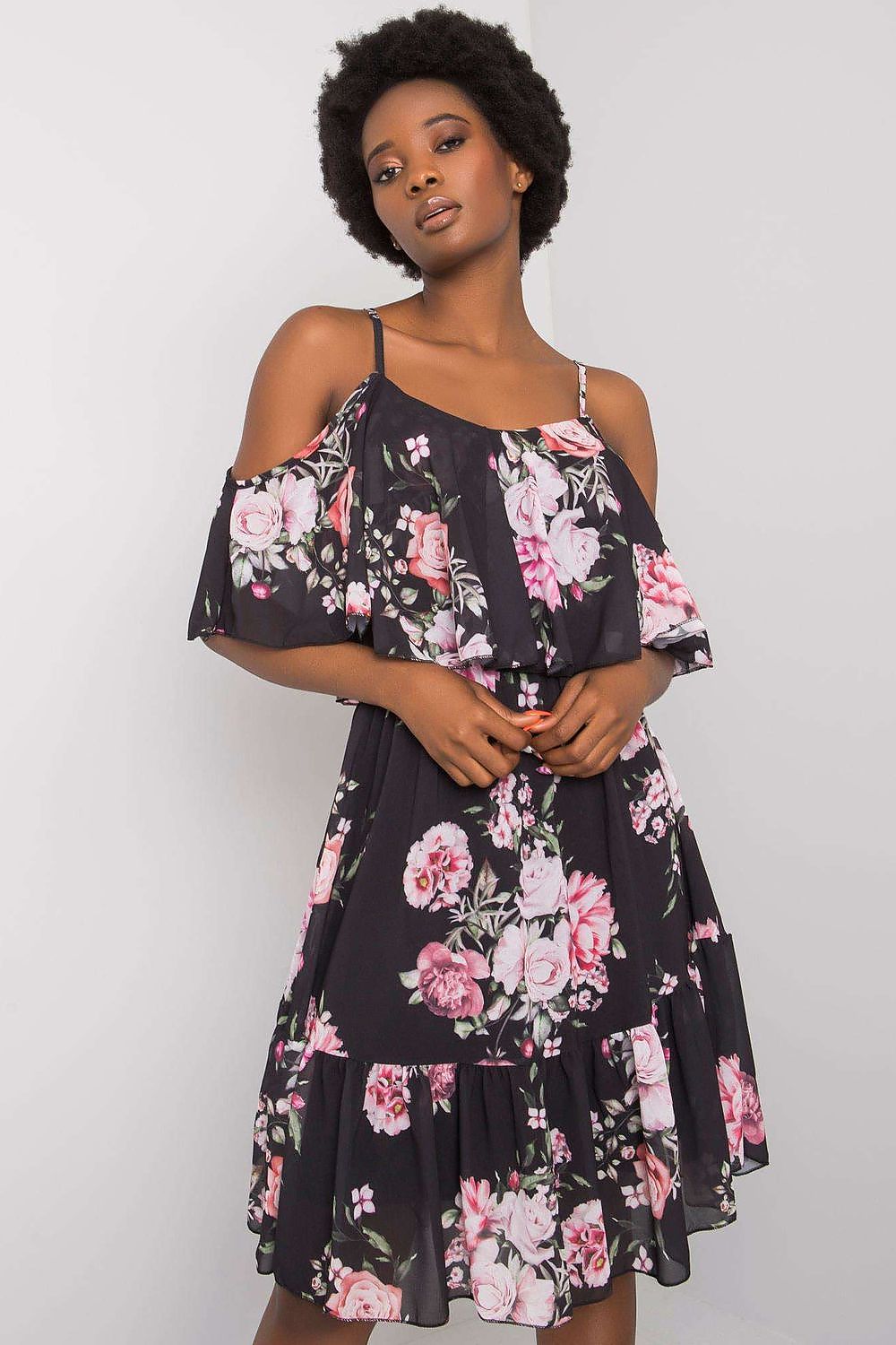 Model showcasing the Och Bella Floral Strapless Daydress with Frill - Elegant Flared Cut, perfect for any occasion. The dress features a striking floral design with short sleeves and a flared silhouette, ideal for both casual and formal settings.