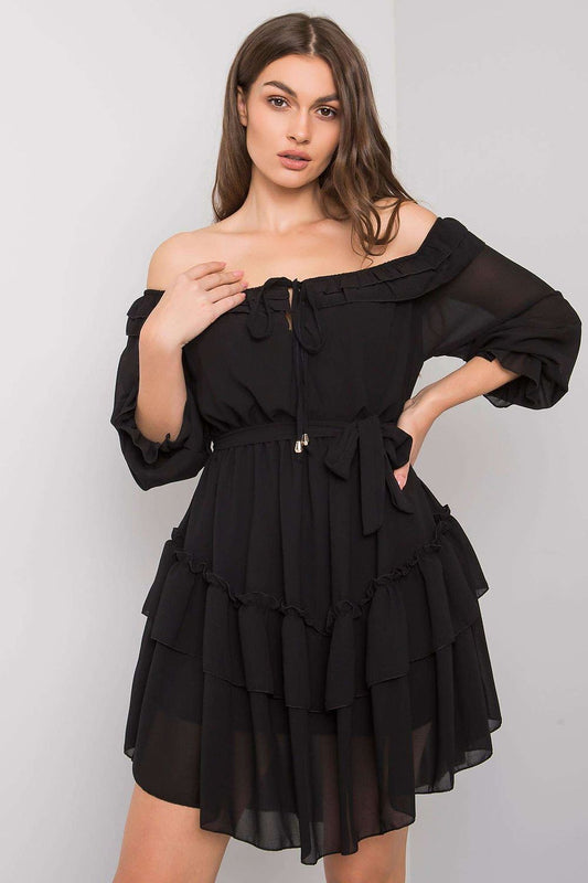 Elegant Och Bella Spanish Style Daydress featuring frills and 3/4 sleeves, model showcasing the luxurious black dress, ideal for various occasions.