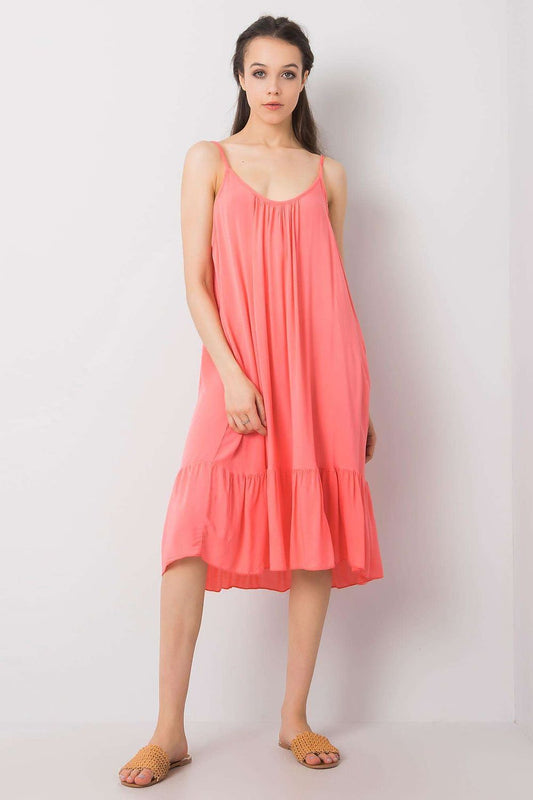Stylish strapless flared daydress with frill by Och Bella, showcasing summer elegance in vibrant coral, perfect for sunny outings.