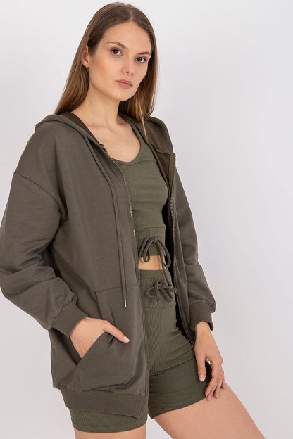 Luxury 3-Piece Set: Hooded Sweatshirt, V-Neck T-Shirt & High-Waisted Shorts in Cotton Blend, highlighting a model with an elegant appearance dressed in olive-green ensemble, including a zip-up hooded sweatshirt and matching shorts.