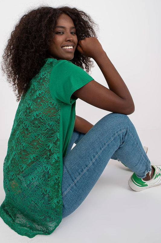 Chic view of the Elegant Short Sleeve Blouse with Lace Back and Cheese Neckline, highlighting intricate lace detailing, model sitting gracefully.