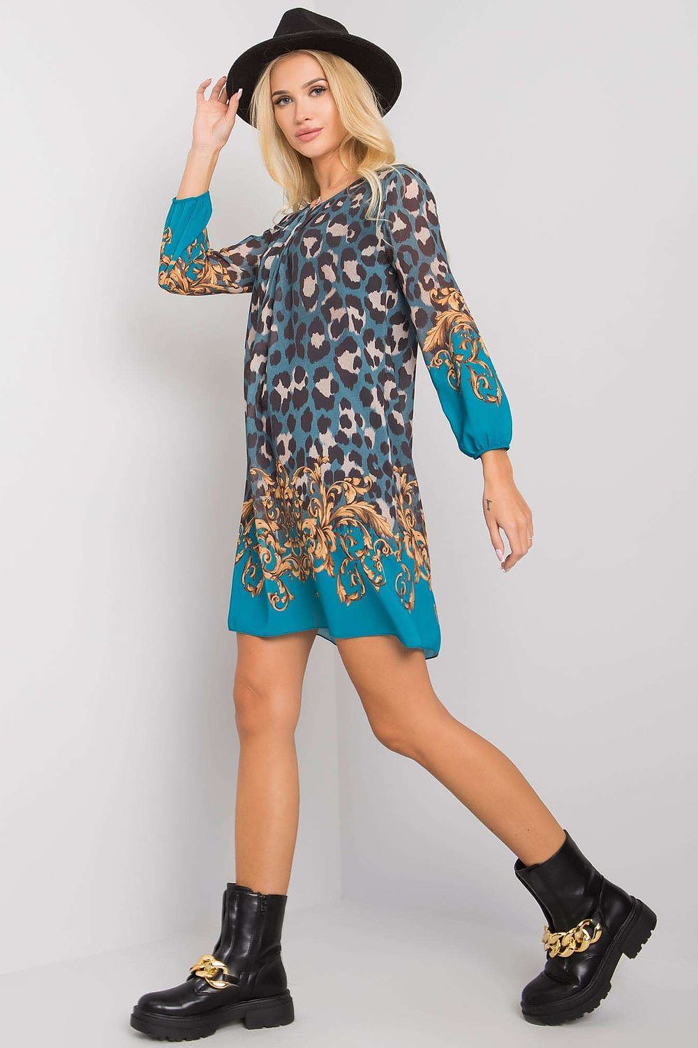 Luxurious Och Bella Loose-Fitting Daydress with 3/4 Sleeves and Rounded Neckline, showcasing a fashionable side view with intricate floral details at the hem.