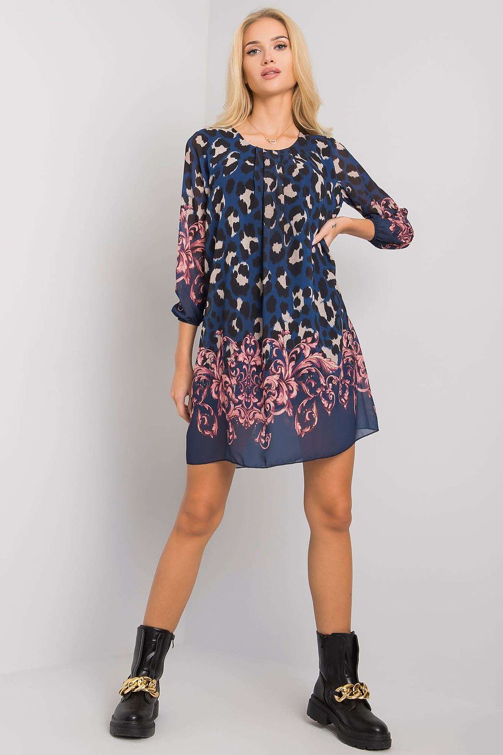 Luxurious Och Bella Loose-Fitting Daydress with 3/4 Sleeves and Rounded Neckline, elegantly posed against a minimalist backdrop, showcasing its vibrant navy colour and intricate patterns.