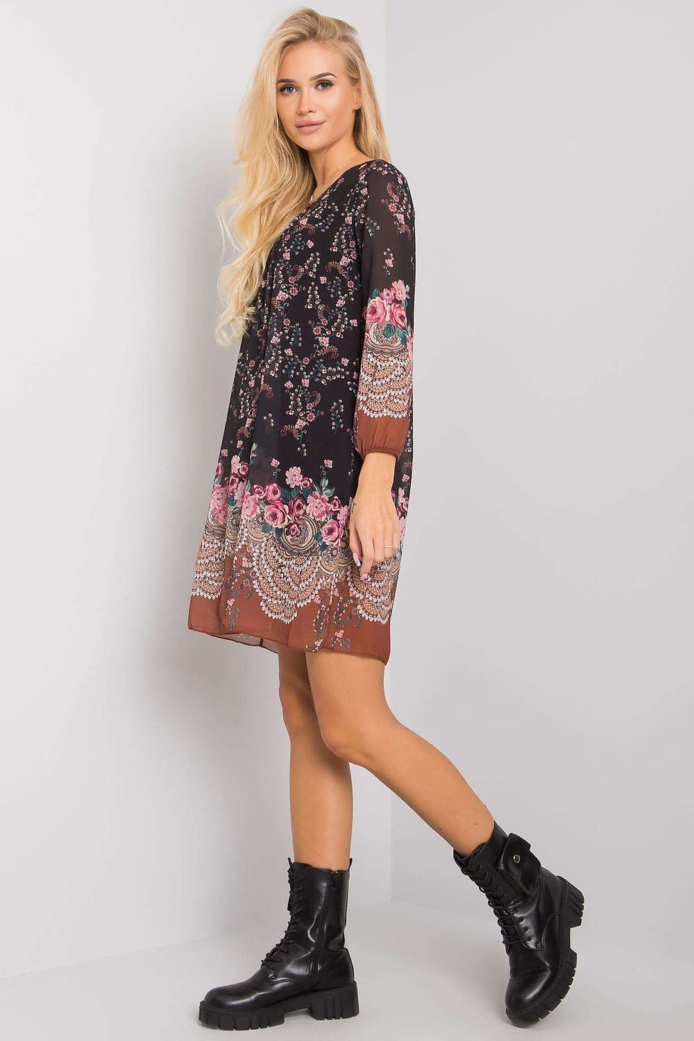 Luxurious Och Bella Loose-Fitting Daydress with 3/4 Sleeves and Rounded Neckline, showcasing a model wearing the dress in a stylish pose, highlighting its floral design and elegant silhouette.