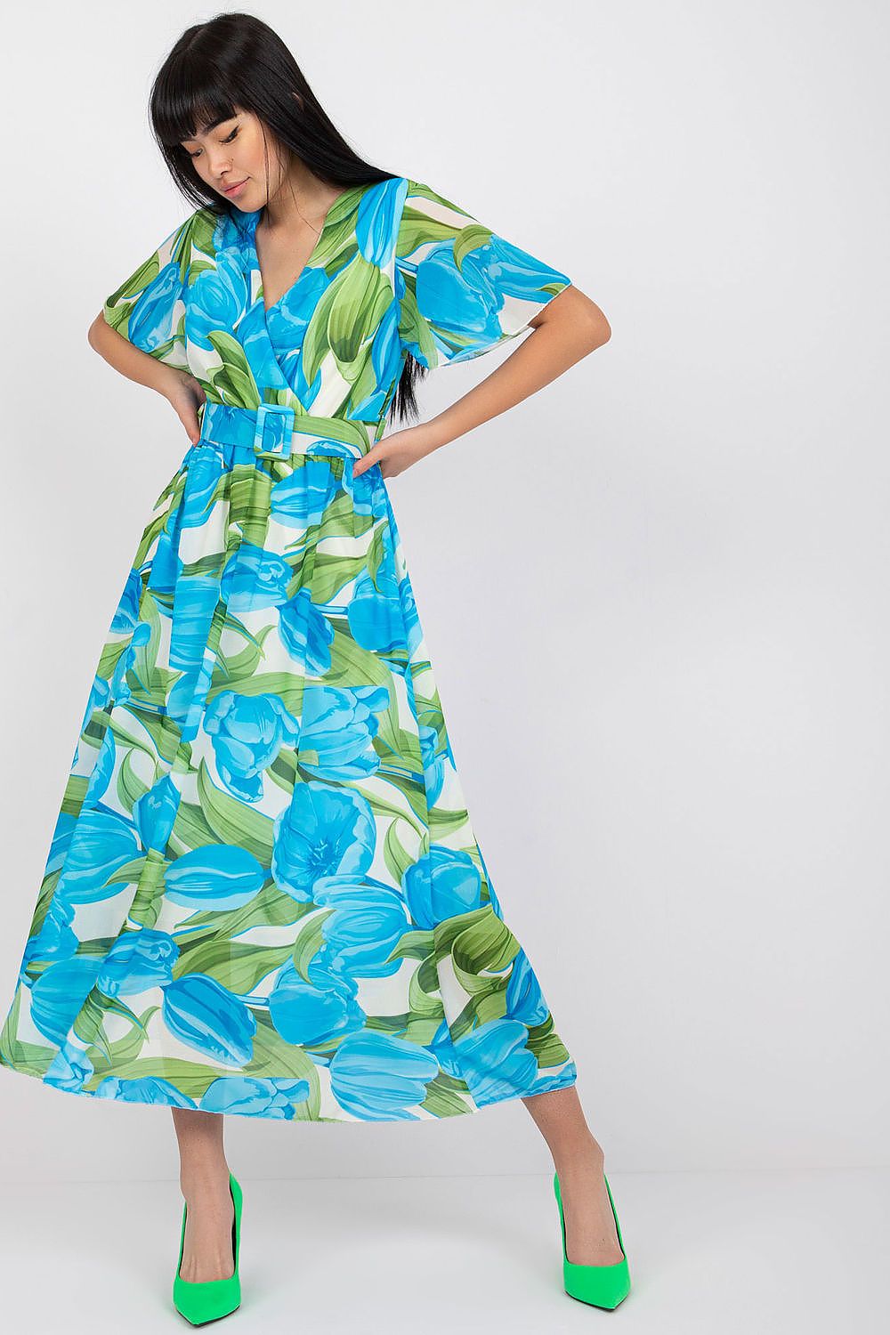 Elegant Summer Dress with Short Frilled Sleeves and Belted Waist by Italy Moda, featuring a graceful pose highlighting turquoise floral patterns, ideal for glamorous summer outings.