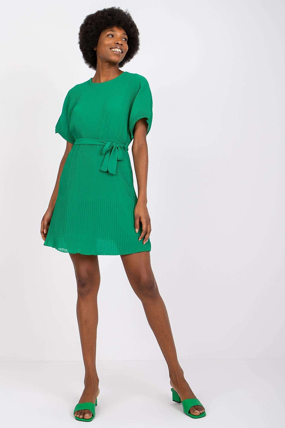 Elegant lined dress with short sleeves, tie belt & elastic waist by Italy Moda, showcased on a model with a stylish afro hairstyle in a vibrant green color.
