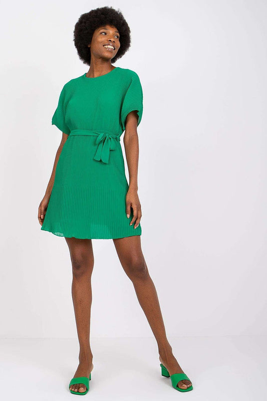 Elegant lined dress with short sleeves, tie belt & elastic waist by Italy Moda, showcased on a model with a stylish afro hairstyle in a vibrant green color.