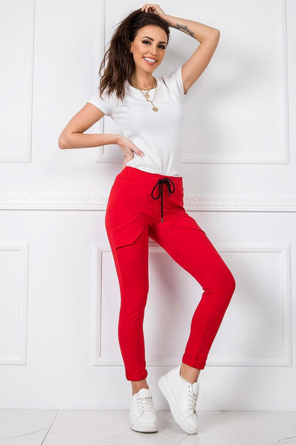 Fashionable BFG Women's High-Waisted Cotton Blend Tracksuit Trousers with Slim Leg and Drawstring in red, model poses confidently highlighting the versatile design suitable for stylish casual wear.