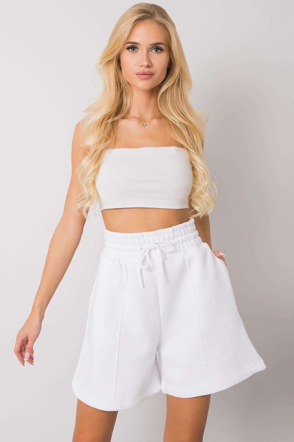 Elegant Cotton Women's Shorts with Elastic Waistband and Slip-On Pockets by BFG, displayed on a model with long blonde hair, featuring a luxurious white colour, perfect for stylish summer wear.