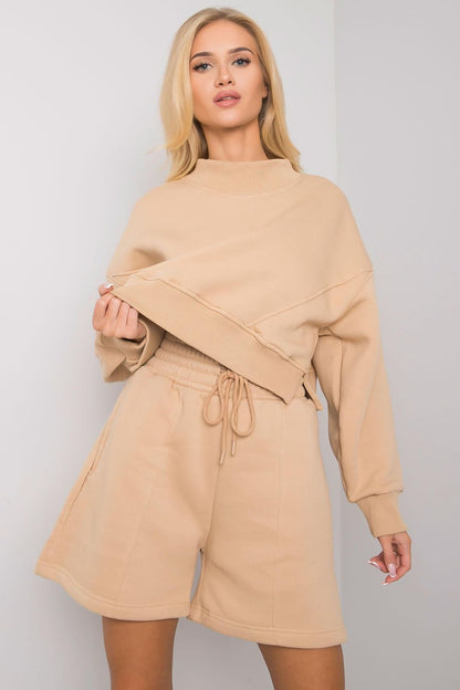 Elegant Cotton Women's Shorts by BFG, featuring an elastic waistband and stylish slip-on pockets, showcased in a chic ensemble.