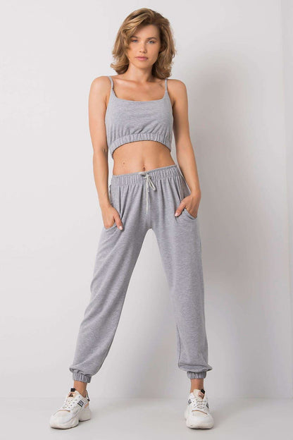 Ex Moda Women's Sports Set - Adjustable Strap Top & Elastic Waist Sweatpants with Pockets, showcasing an elegant grey sports set with a cropped top and sweatpants, perfect for sophisticated leisurewear.