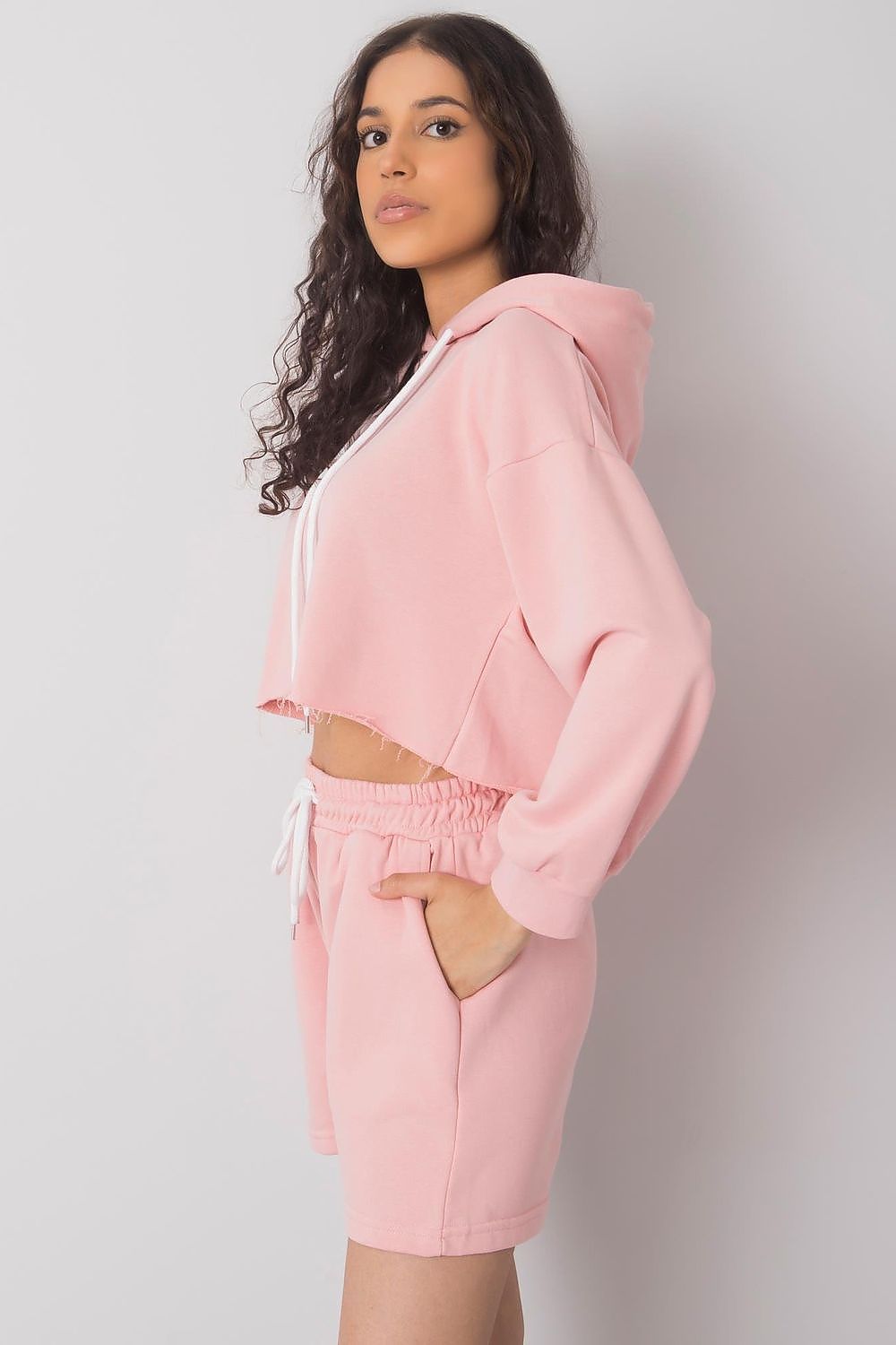 Luxurious Cotton-Blend Tracksuit Set with Sweatshirt and Shorts, highlighting the trendy cropped sweatshirt and stylish shorts in delicate pink, ideal for luxurious loungewear from Ex Moda Fashion.