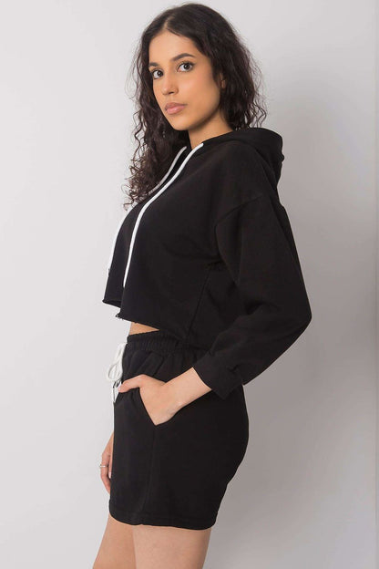 Luxurious Cotton-Blend Tracksuit Set with Sweatshirt and Shorts - Ex Moda Fashion, displaying a side view of the model in a black cropped sweatshirt and tailored shorts.