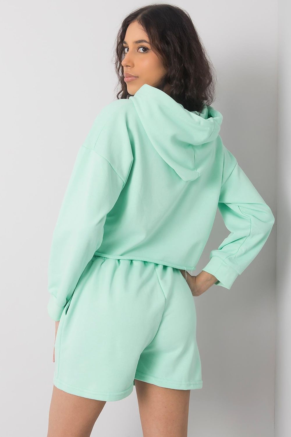 Elegant mint green Luxurious Cotton-Blend Tracksuit Set featuring a hooded crop sweatshirt and shorts, designed for luxury and comfort - Ex Moda Fashion.