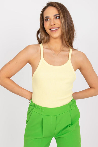 Ex Moda Yellow Summer Strapless Cotton Shirt with Spandex - EU Size 0, showcased in a stylish summer setting, paired with vibrant green trousers, exemplifying chic summer fashion.