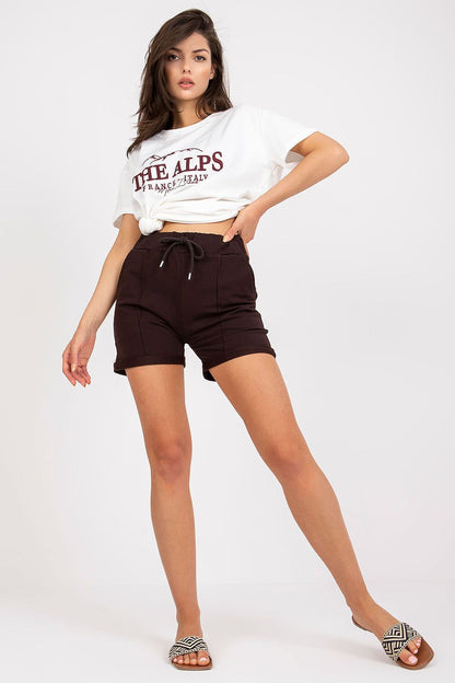 Luxury Cotton High-Waisted Shorts with Tie Waist and Pockets – EU Size 0, showcased in a stylish outfit featuring a white cropped t-shirt and elegant slide sandals.