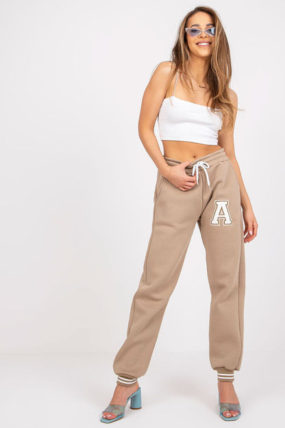 Ex Moda Women's Cotton-Blend Sweatpants with Elastic Waistband and Slip-On Pockets displayed elegantly by a model in a neutral tone, styled with a fitted crop top and chic accessories for an upscale look.