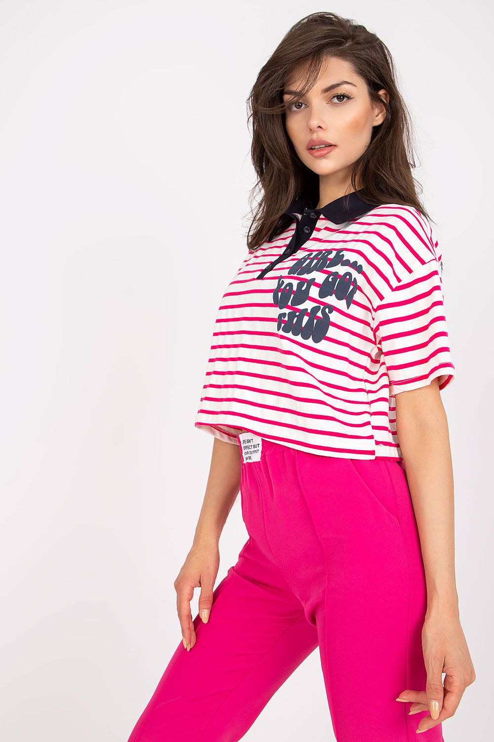 Stylish Striped Cotton Polo Blouse with Decorative Print – EU Size 0, elegantly presented by a model, side view showcasing the textile details and pink fabric bottoms.