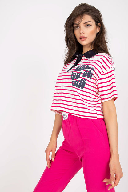 Stylish Striped Cotton Polo Blouse with Decorative Print – EU Size 0, elegantly presented by a model, side view showcasing the textile details and pink fabric bottoms.