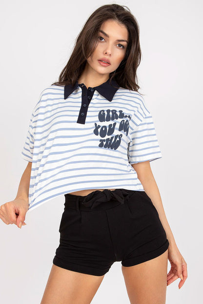 Chic model showcasing the Stylish Striped Cotton Polo Blouse with Decorative Print - EU Size 0, featuring short sleeves and a stylish blue and white striped design, perfect for a trendy summer look.