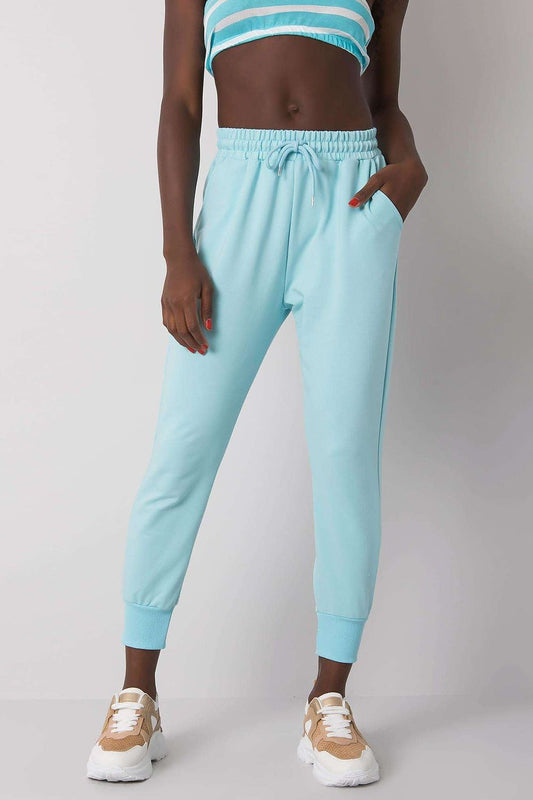 Luxury Tracksuit Trousers with Waist Tie and Elastic Band - Comfortable Cotton Blend Sweatpants, showcased on a model wearing a light blue outfit with a matching crop top, highlighting the stylish design and elastic fit.