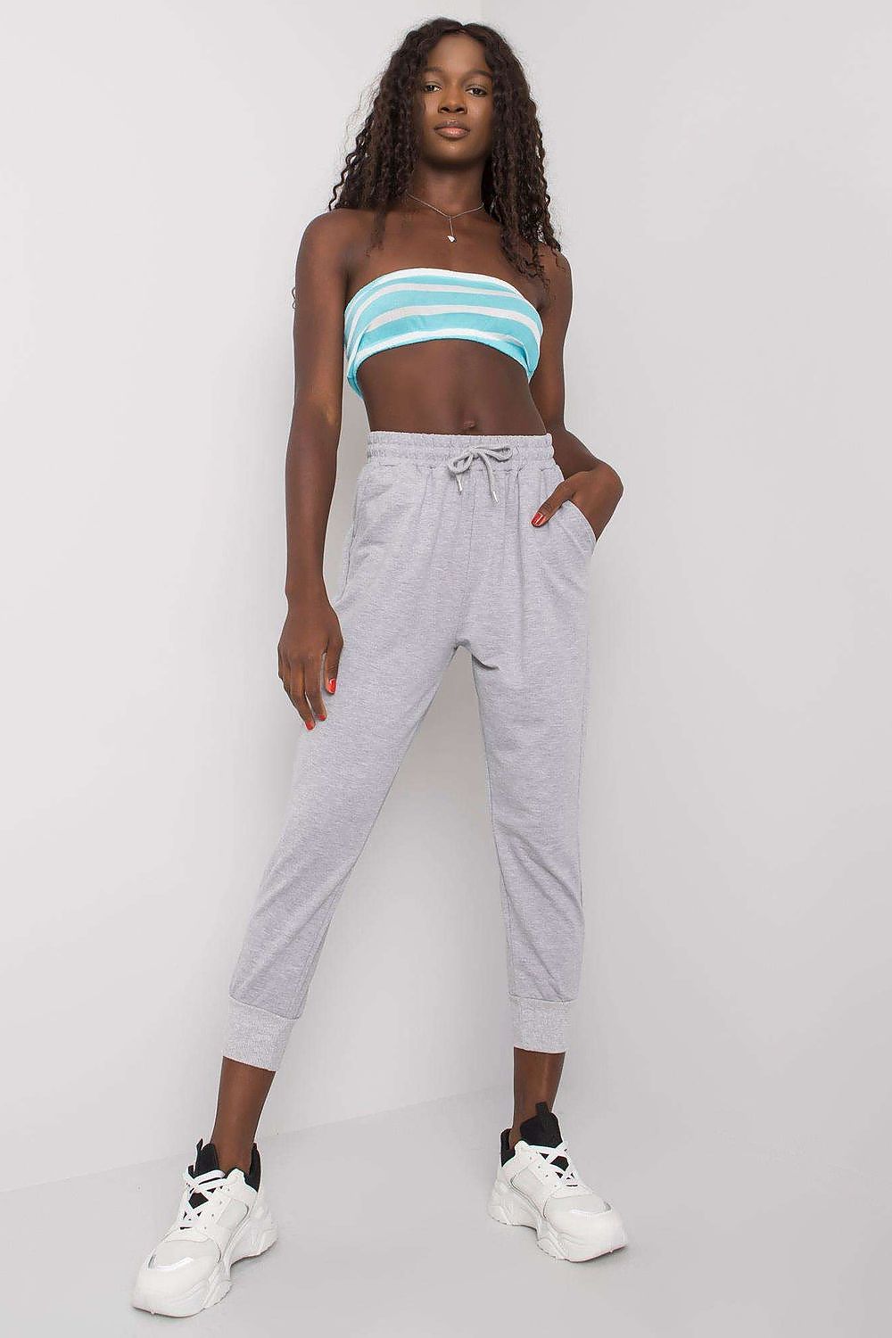 Luxury Tracksuit Trousers with Waist Tie and Elastic Band - Comfortable Cotton Blend Sweatpants model elegantly styled in grey sweatpants, enhancing casual luxury.