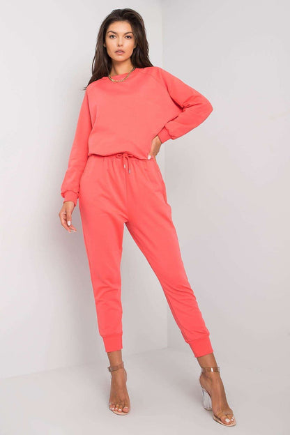 Luxury Tracksuit Trousers with Waist Tie and Elastic Band - Comfortable Cotton Blend Sweatpants worn by a model in coral shade, showcasing a stylish streetwear look.