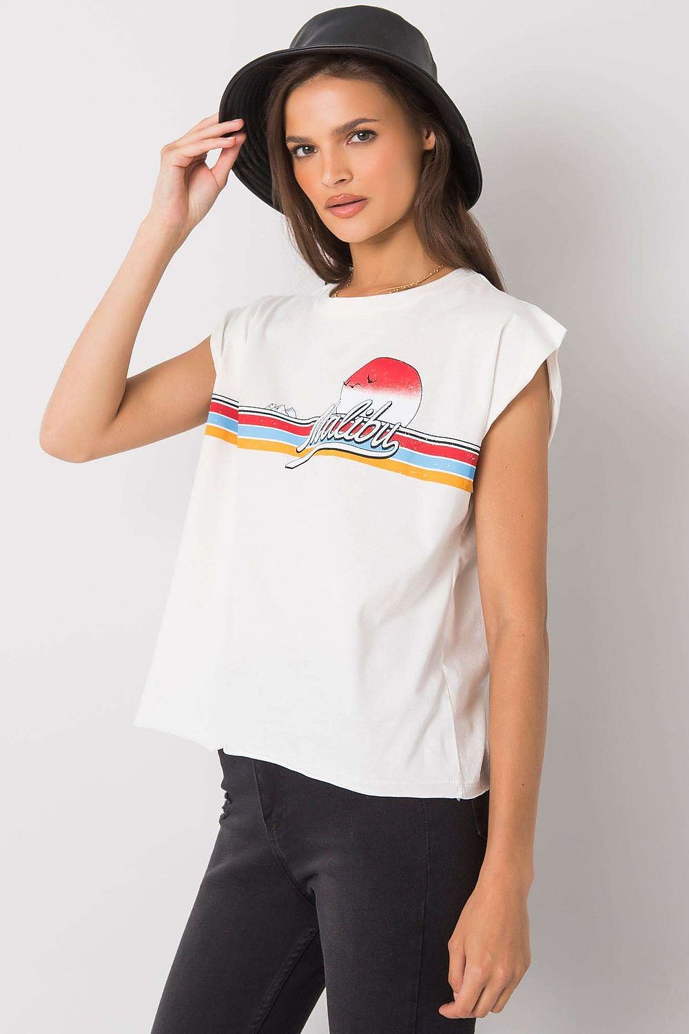 Luxury 100% Cotton Short Sleeve T-Shirt with Front Print in white, model adjusting her hat, showcasing the design and round neckline, EU Size 0.