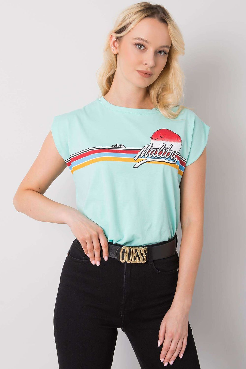 Luxury 100% Cotton Short Sleeve T-Shirt with Front Print, EU Size 0, Round Neckline, model posing in mint green T-shirt with a chic printed design.