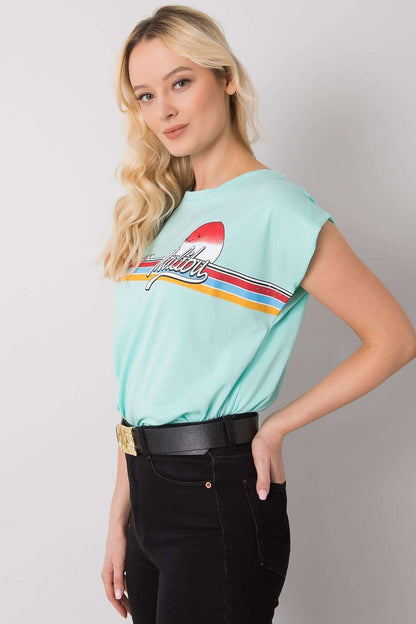Luxury 100% Cotton Short Sleeve T-Shirt with Front Print, EU Size 0, Round Neckline, side profile of a model wearing a mint green T-shirt with a trendy print.