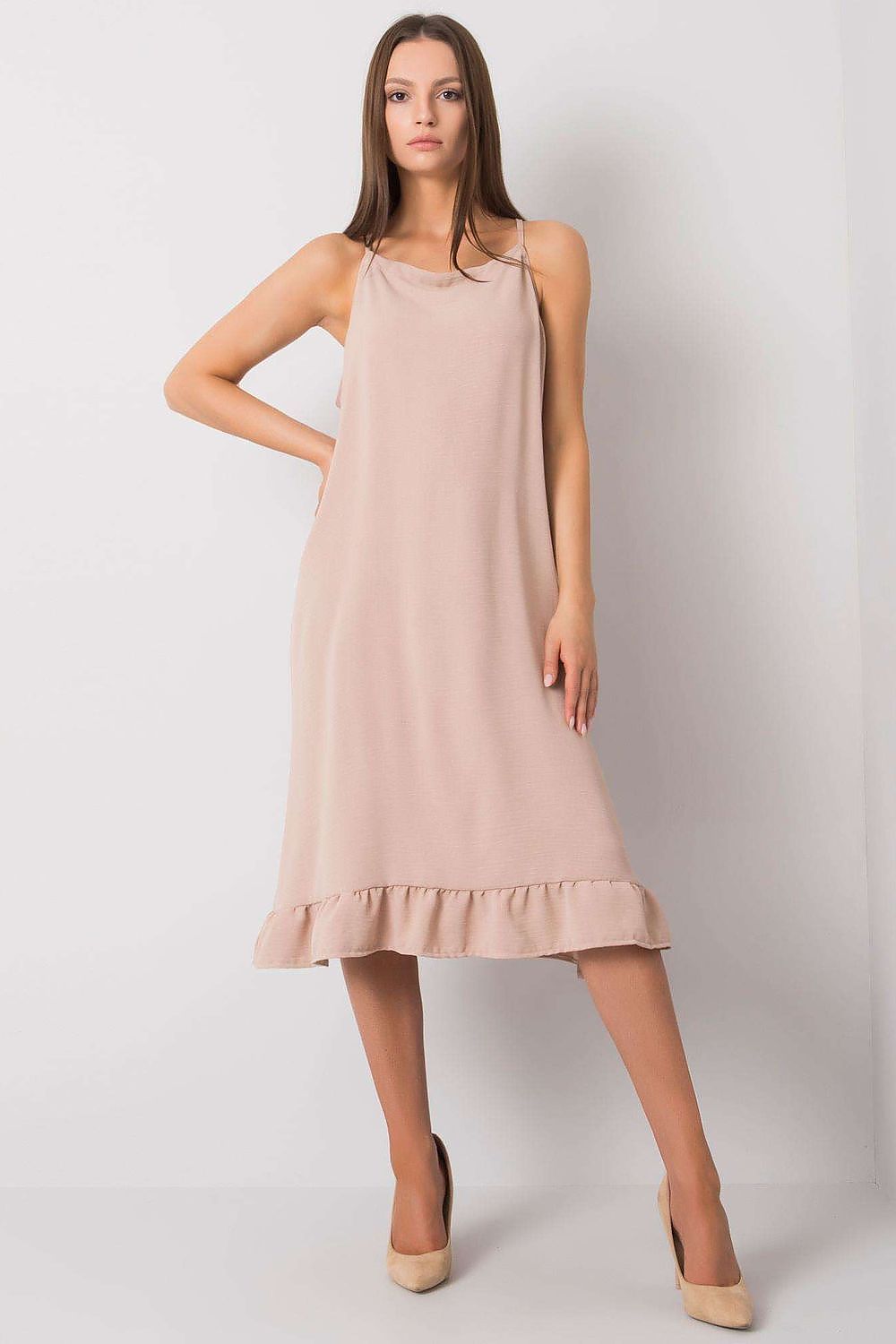 Elegant Cotton Summer Dress with Shoulder Straps and Frill Hem - Perfect for Everyday Wear. A stunning model showcases the dress featuring a delicate frill hem and stylish shoulder straps, exuding a luxurious summer vibe.