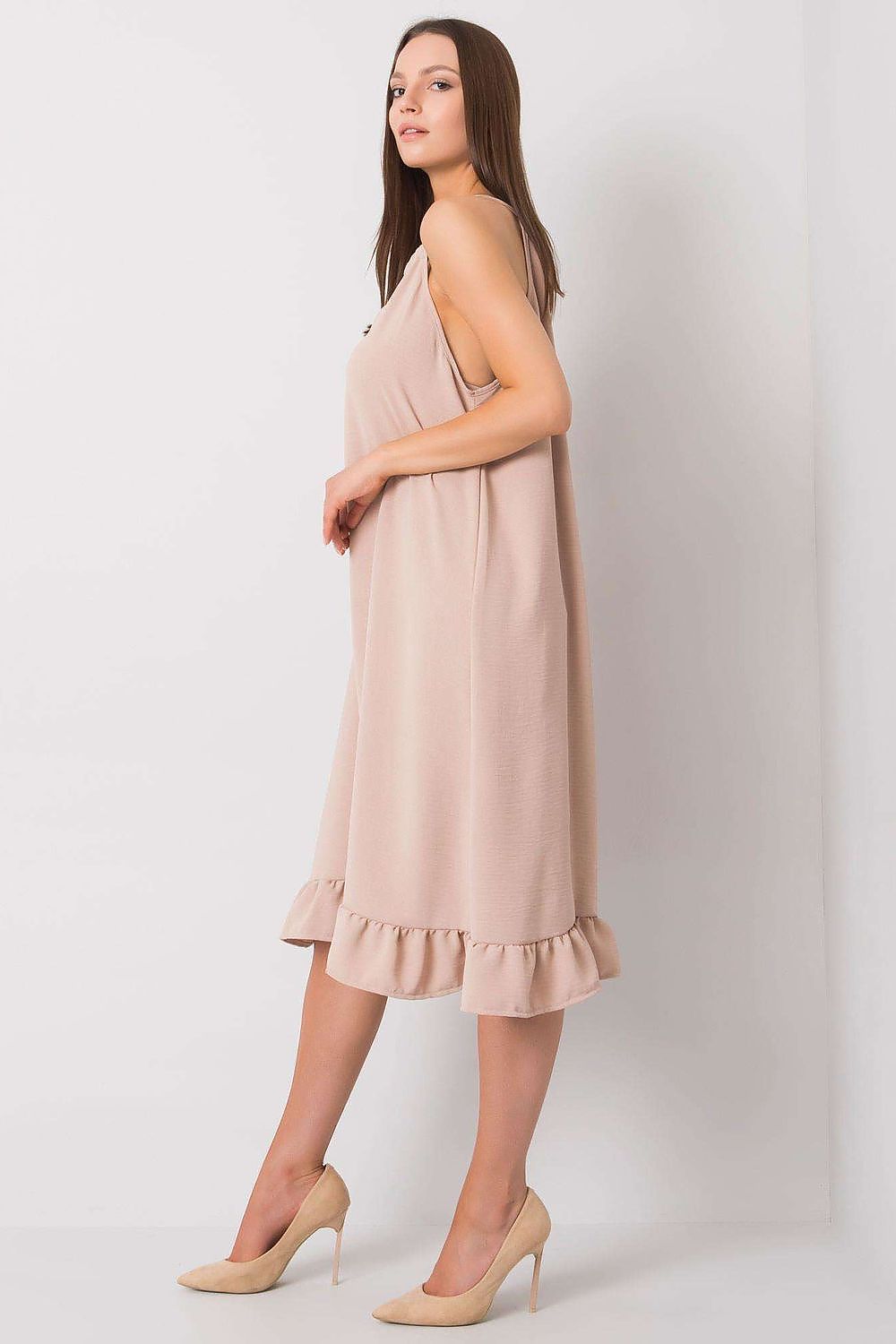 Elegant Cotton Summer Dress with Shoulder Straps and Frill Hem - Perfect for Everyday Wear. A graceful side view of the dress highlights its flowing silhouette and refined frill detailing, perfect for upscale casual occasions.