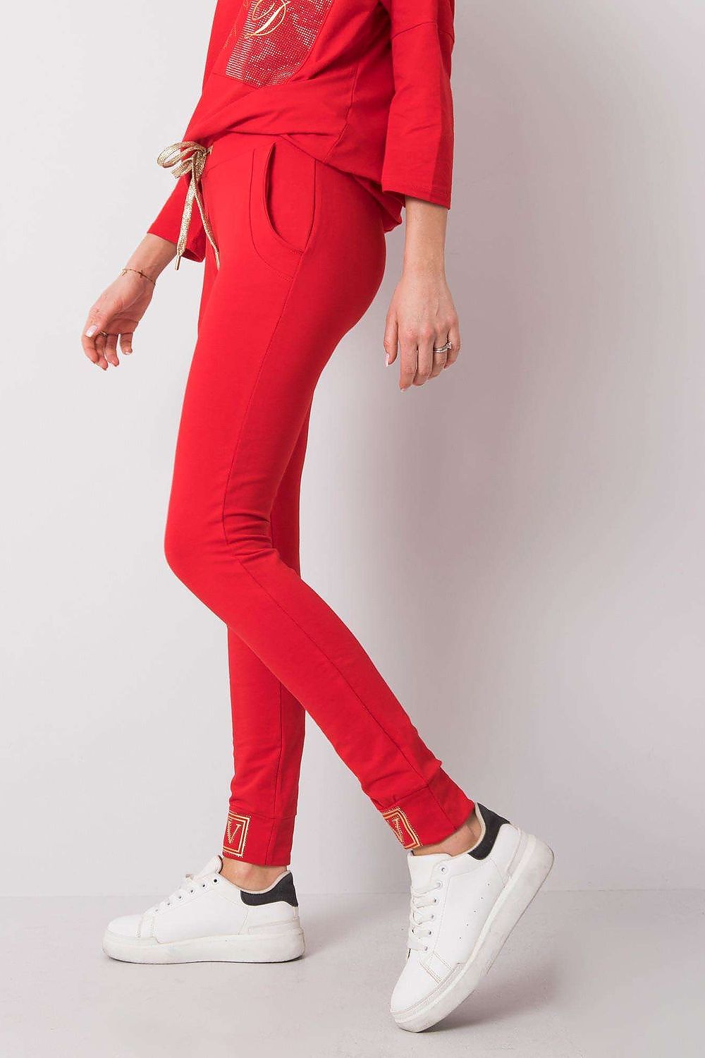Luxury High Rise Sweatpants with Rhinestone Cuffs and Tie Waist - Cotton Spandex Blend, showcased in a vibrant red colour, featuring a stylish tie waist and rhinestone details on the cuffs, perfect for casual elegance.