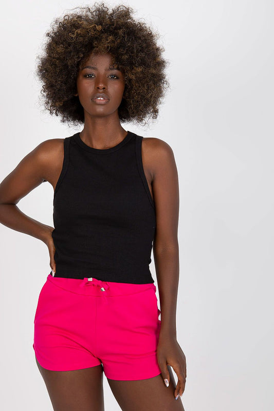 BFG Classic Ribbed T-Shirt in Black, crafted from a luxurious cotton and spandex blend, featuring a stylish round neckline and a fitted silhouette, elegantly showcased on a model wearing vibrant pink shorts.