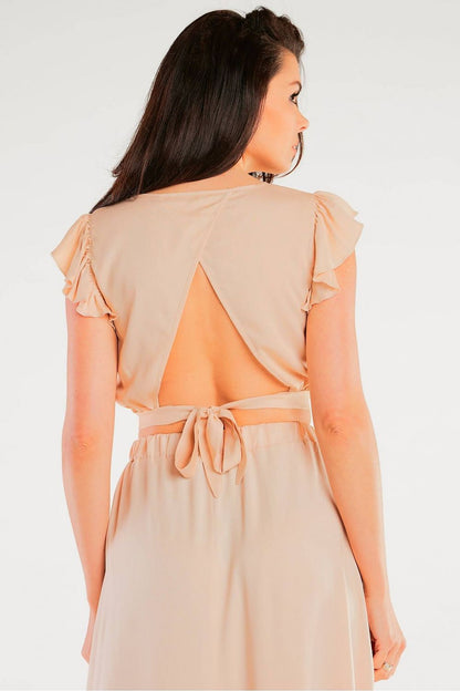 Back view of the Elegant Airy Viscose Blouse with Back Tie and Charming Frills at Sleeves, featuring an open back tied elegantly, showcasing style and refinement.