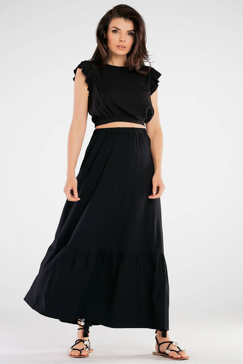 Elegant Airy Viscose Blouse with Back Tie and Charming Frills at Sleeves displayed elegantly with a black skirt, perfect for sophisticated occasions.