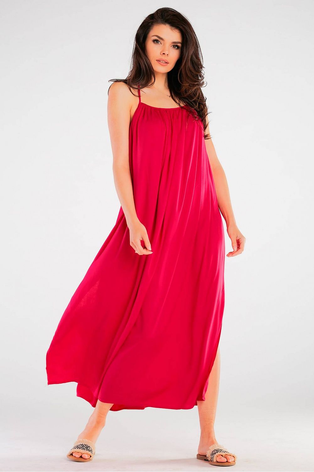 Elegant Maxi Dress by Awama featuring a decorative back ring, crafted from airy viscose for an effortless style. The dress is a stunning shade of red, showcasing a loose cut that flatters any figure.