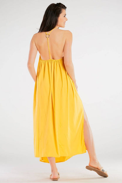 Elegant Maxi Dress by Awama featuring a decorative back ring, captured from the back, showcasing the airy viscose fabric and flowing silhouette for effortless style.
