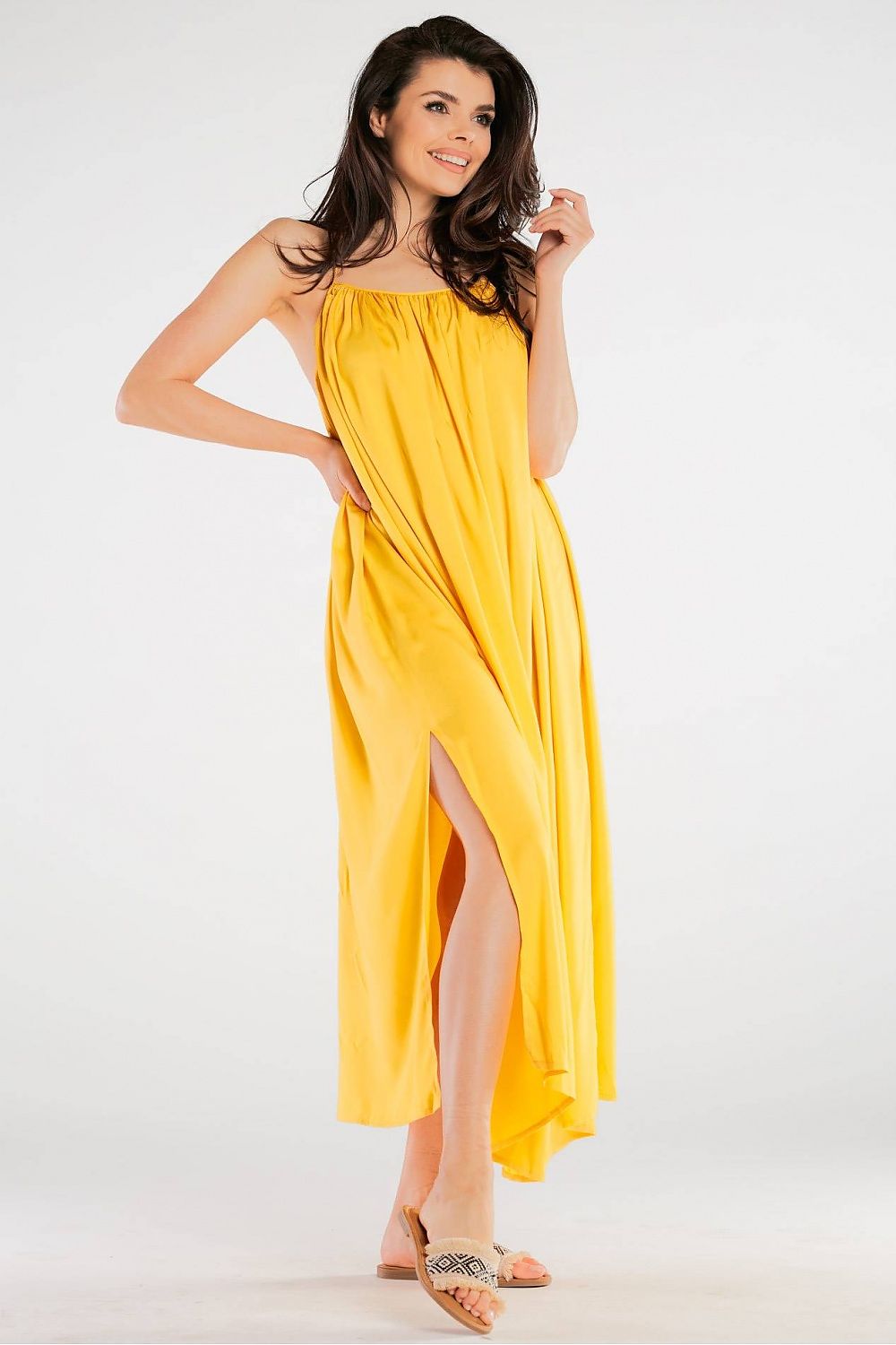 Front view of the Elegant Maxi Dress by Awama, highlighting the loose cut and vibrant yellow colour, perfect for a luxurious summer look.