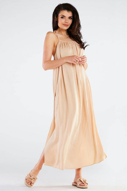 Chic front view of the Elegant Maxi Dress by Awama in a nude tone, showcasing the graceful design and effortless sophistication for any ensemble.