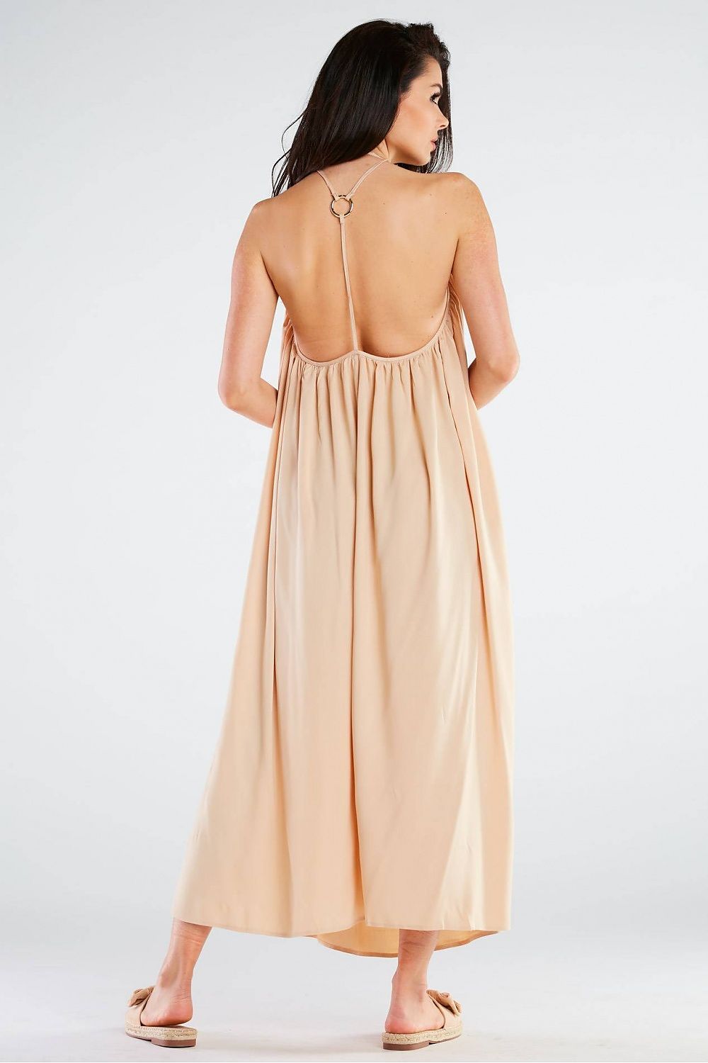Elegant Maxi Dress by Awama with a decorative back ring, featuring a stunning back view that highlights the design's luxurious details and airy fabric.