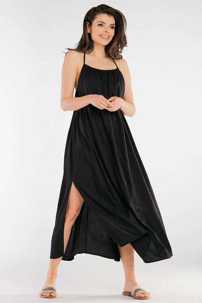 Elegant Maxi Dress by Awama with Decorative Back Ring in Airy Viscose, highlighting the dress’s comfortable fit and effortless style in black.