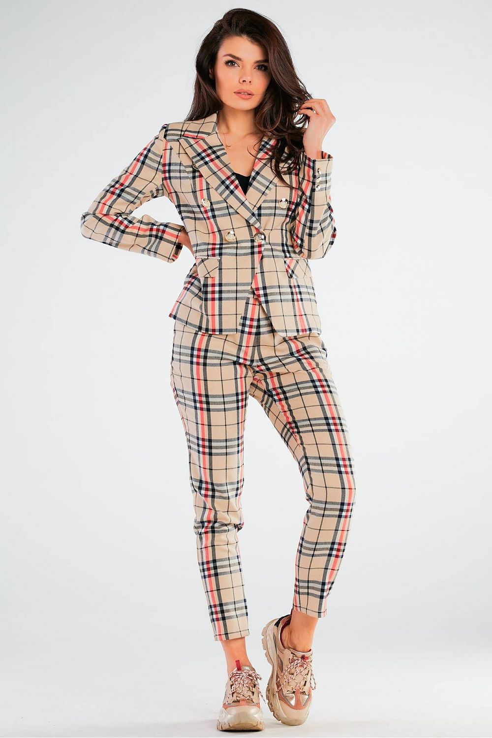 Chic Luxury Double-Breasted Jacket by Awama with wide lapels and golden button details, showcased by a model in a fashionable check pattern ensemble.