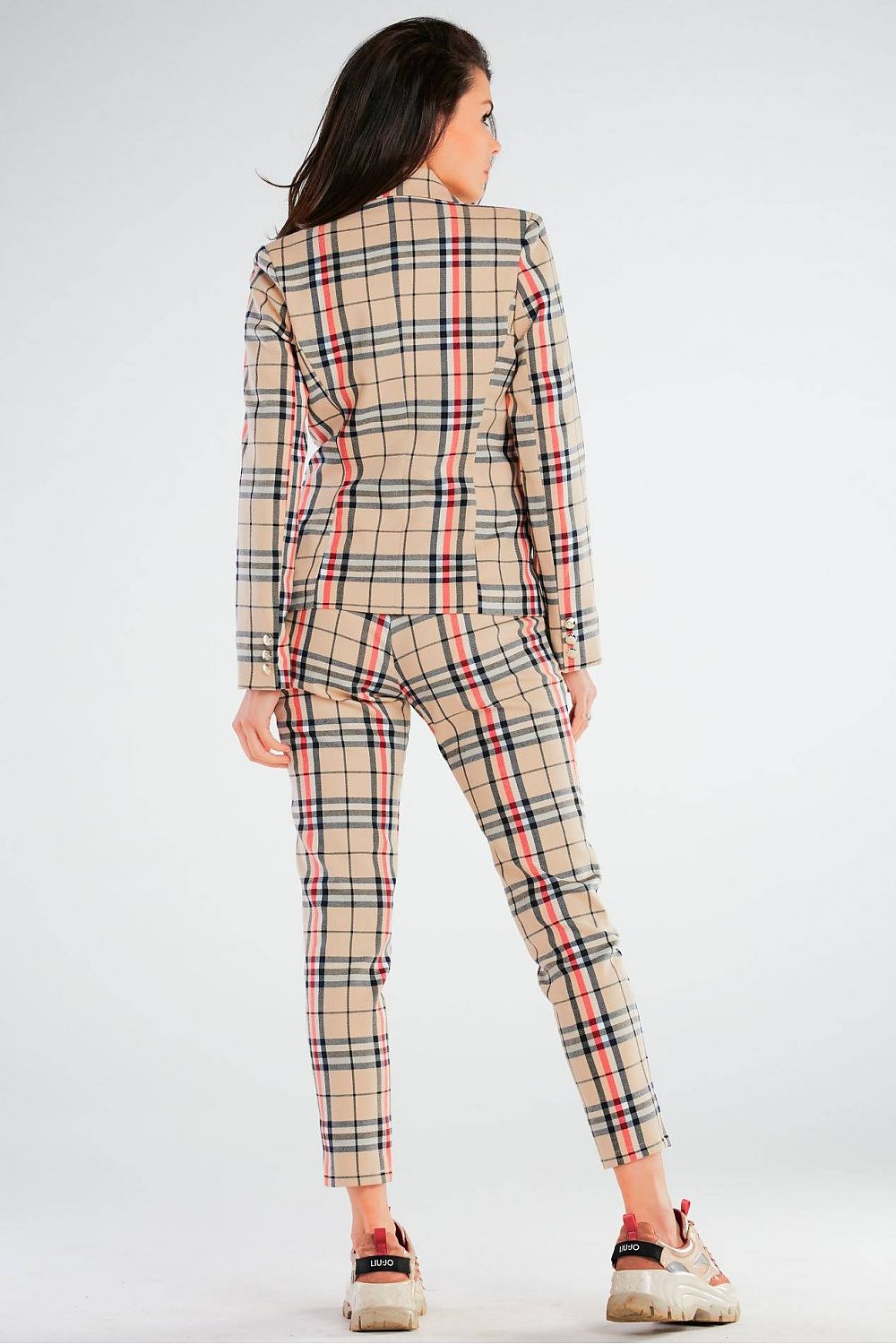 Sleek Luxury Double-Breasted Jacket by Awama with wide lapels and golden button details, seen from behind with a model wearing a coordinating checked suit.