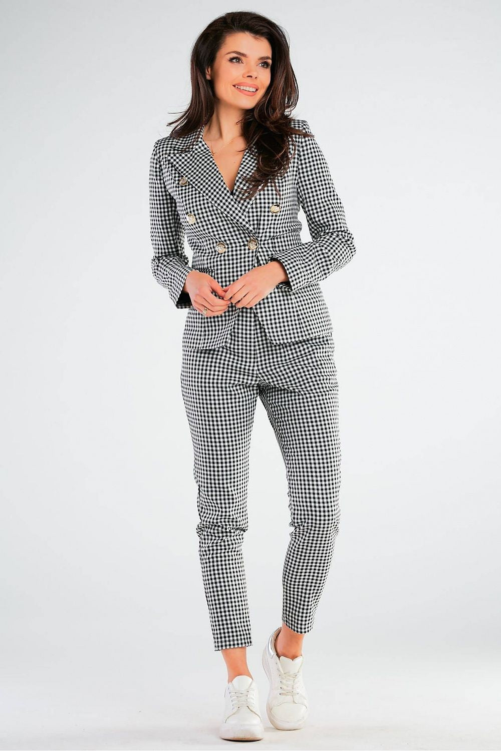 Luxury Double-Breasted Jacket by Awama with Wide Lapels & Golden Button Details, displayed on a model exuding elegance in a stylish checkered outfit, perfect for fashion-forward occasions.