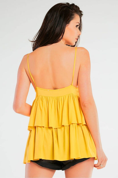 Elegant Loose-Fitting Viscose Blouse With Thin Straps And Frill Detailing by Awama, featuring an alluring back view on a model, showcasing the intricate frill detailing and lightweight fabric.