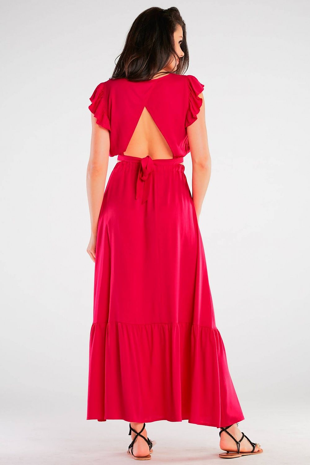 Elegant Maxi Skirt with Frill Detail, highlighting the back design of a red dress worn by a stylish model, showcasing its luxurious feel and perfect cut.
